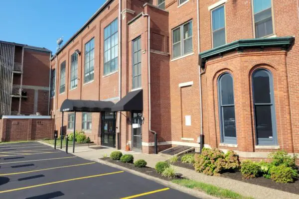 20210727_093629 310 E Broadway Professional Building parking lot side view