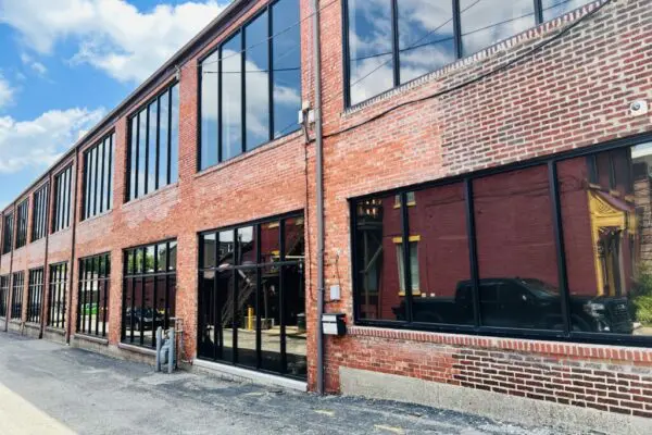 445 Baxter Town Talk Building Side