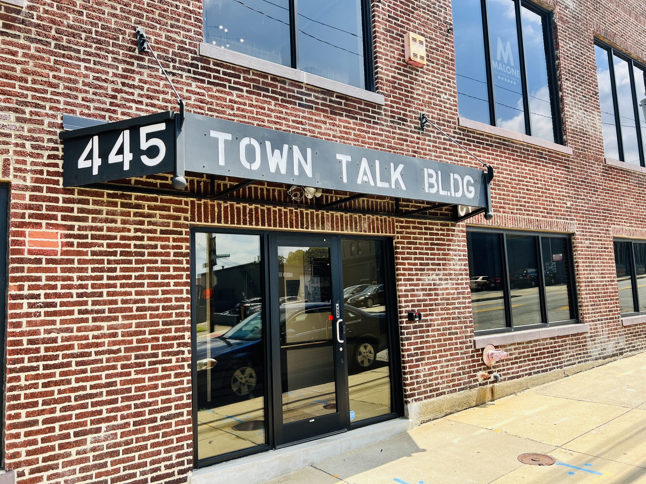 445 Baxter Town Talk Building Front Entrance